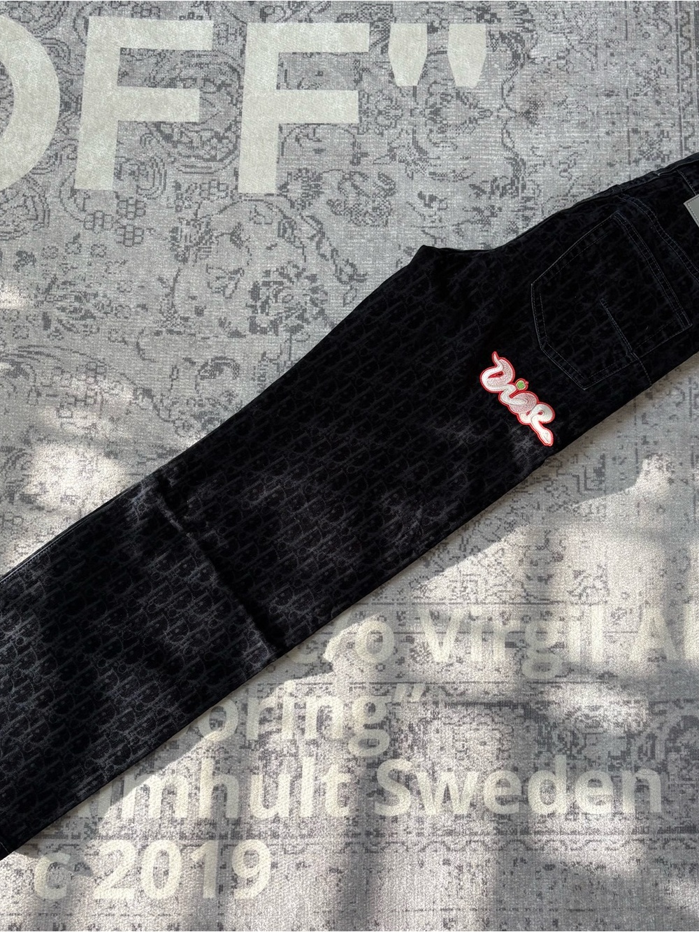 Dior Black Straight Jeans with Red Script Patch